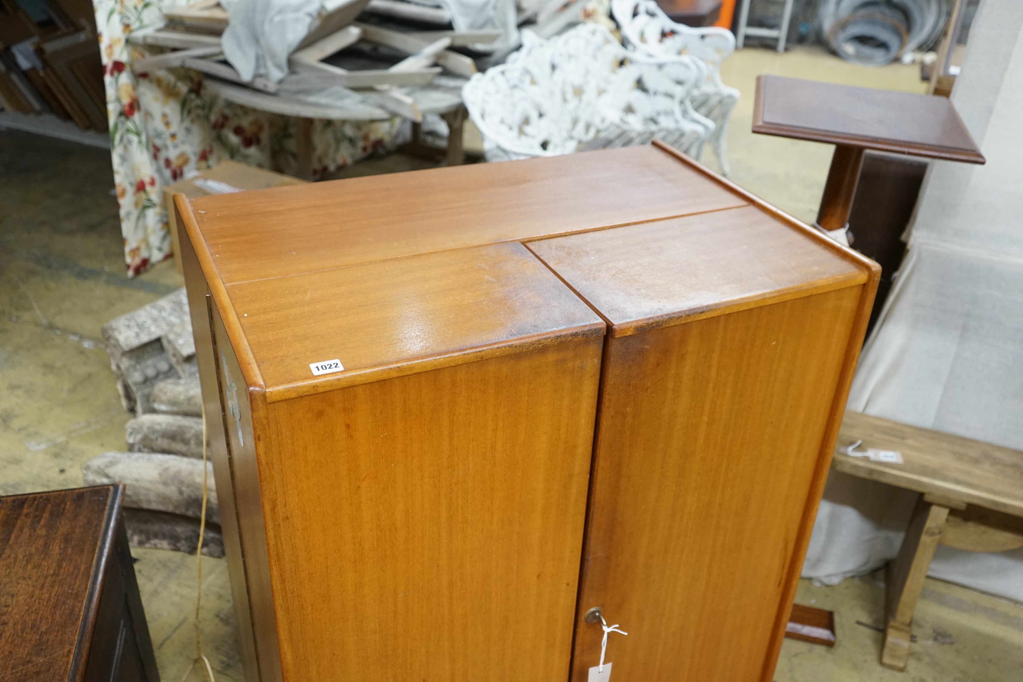 A mid century teak 'Magic Box' enclosed desk, width 82cm, depth 54cm, height 115cm